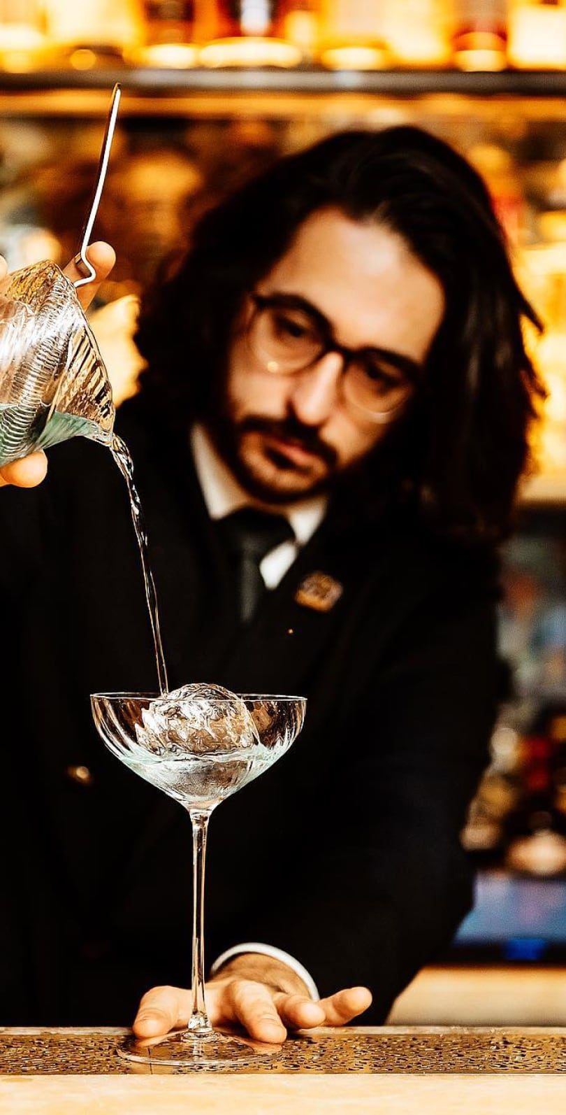 Bartender pouring a cocktail at Annabel's