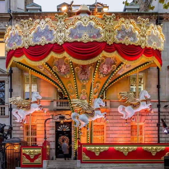 Club facade transformed into a fairground carousel