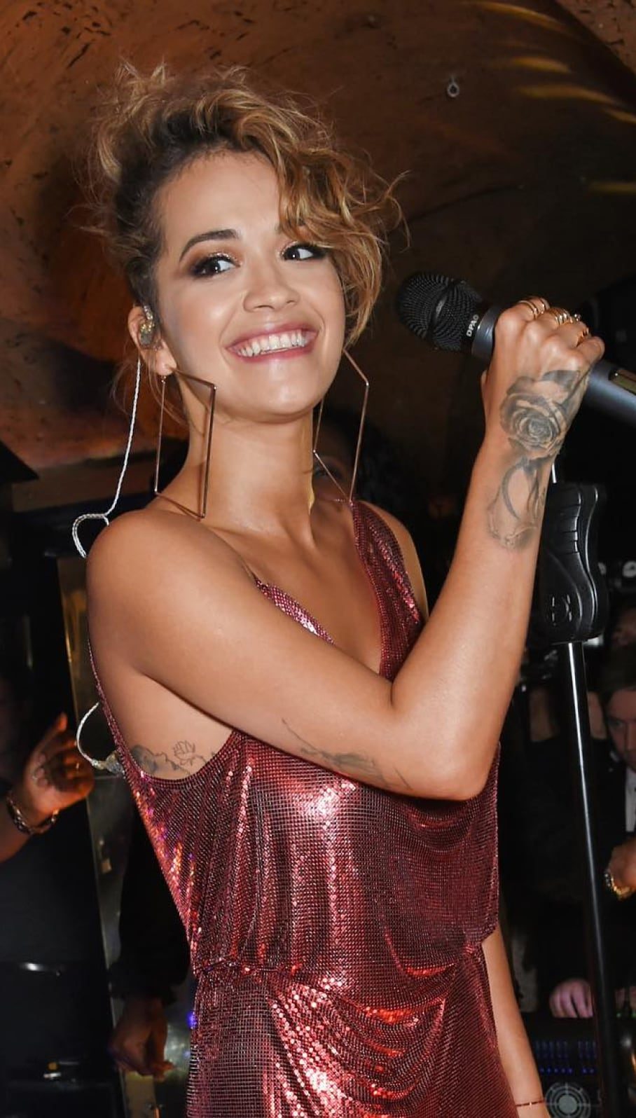 Performer singing on stage at the club